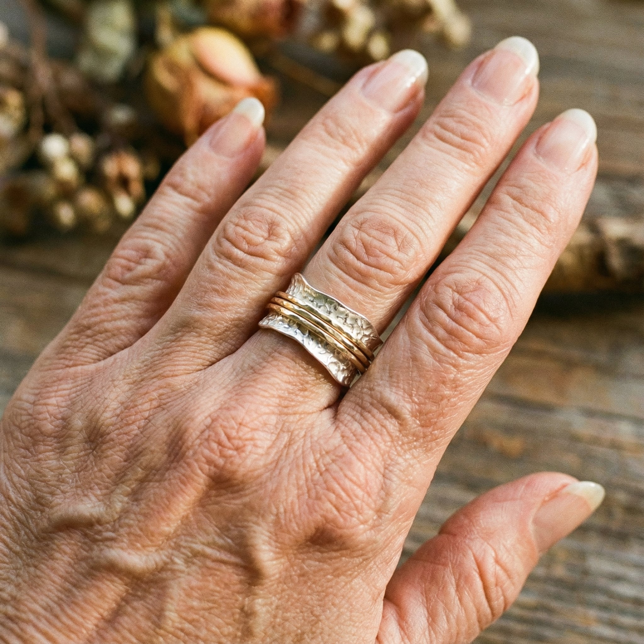 Fin vintage drejelig ring i guld og sølv