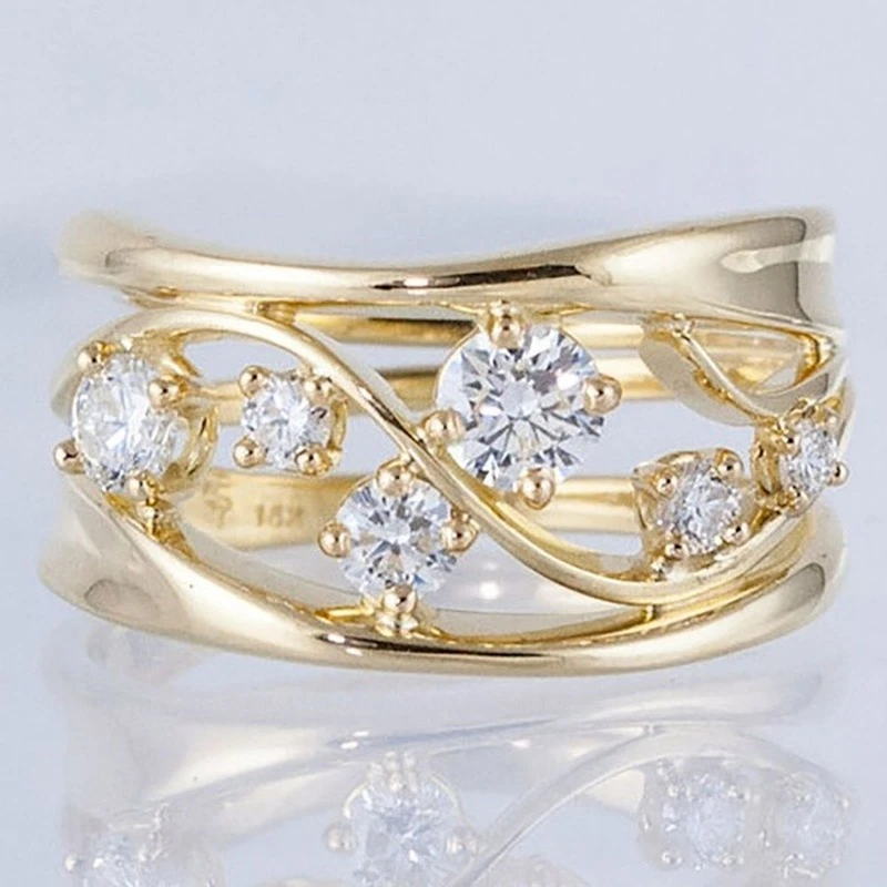 Elegant Gylden Ring med Zirkoner