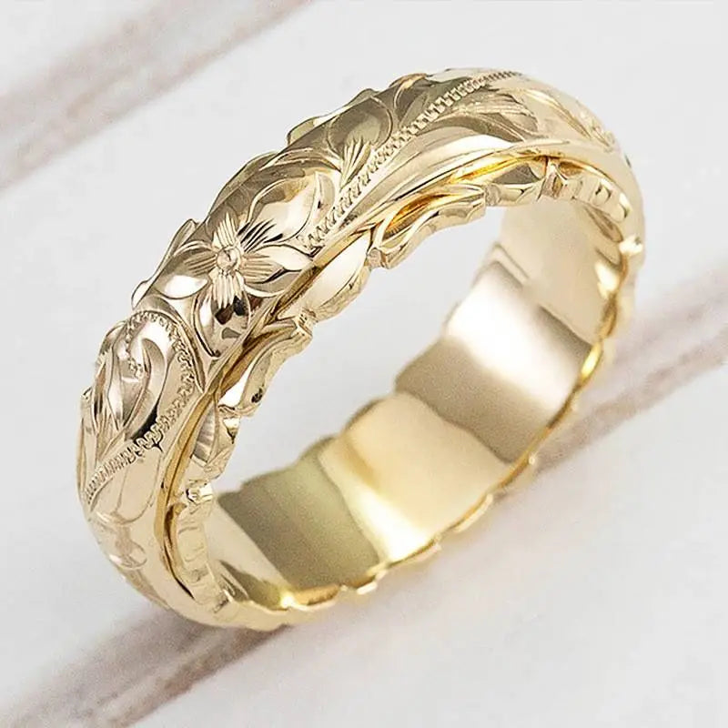 Vintage guldfarvet ring med blomst