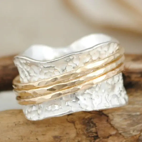 Fin vintage drejelig ring i guld og sølv